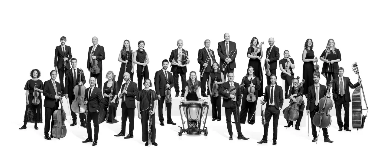 The Scottish Chamber Orchestra players in concert dress with their instruments
