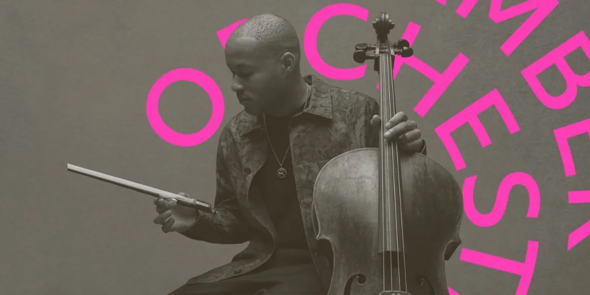 Sheku Kanneh-Mason holds his cello and an outstretched bow